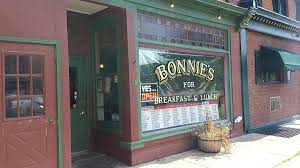 Bonnie's brick storefront on Genesee Street with autumn decor