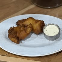 Beer-battered fried fish with tartar sauce at Bonnie's