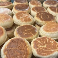 Rows of perfectly golden English muffins fresh from the oven at Bonnie's